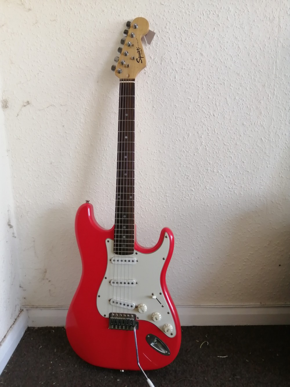 A Squier Strat electric guitar